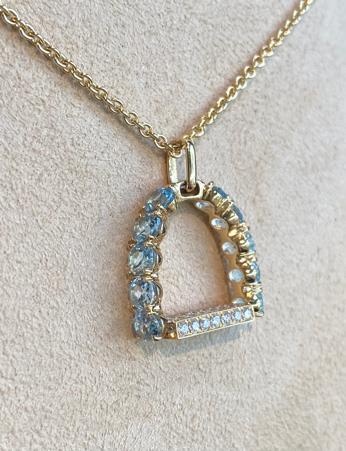 “Stirr It Up” Diamond and Blue Topaz Pendant